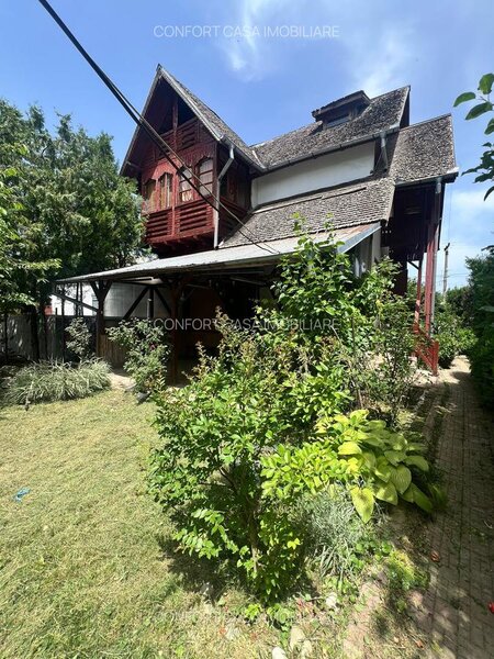 Izvorani, casa de lemn cu gradina si piscina,